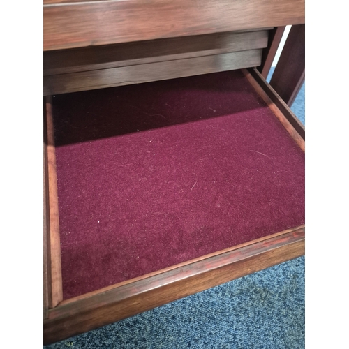 209 - A REPRODUCTION MAHOGANY EFFECT COLLECTORS CABINET, the single glass door enclosing fourteen shallow ... 