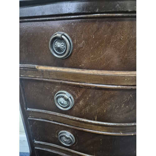 210 - A REPRODUCTION MAHOGANY SERPENTINE CHEST OF SIX DRAWERS, of small proportions, raised on bracket fee... 