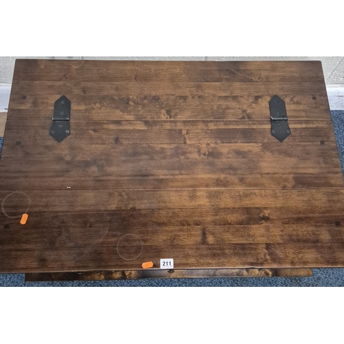 211 - A LAURA ASHLEY GARRAT DARK CHESTNUT COFFEE TABLE, with a bank of nine drawers and a hinged storage c... 