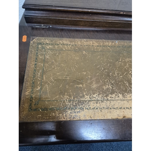 216 - AN EARLY 20TH CENTURY MAHOGANY DAVENPORT, with a small hinged compartment, a hinged leather writing ... 