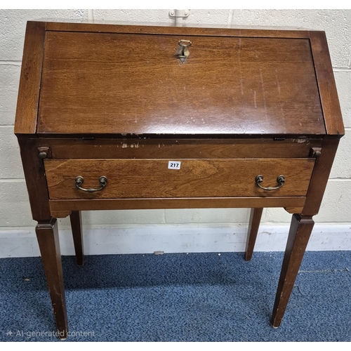 217 - A REPRODUCTION BUREAU, the fall front door enclosing a fitted interior, over a single drawer, raised... 