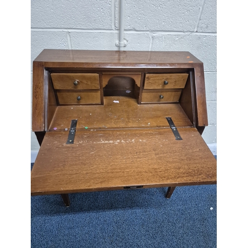217 - A REPRODUCTION BUREAU, the fall front door enclosing a fitted interior, over a single drawer, raised... 