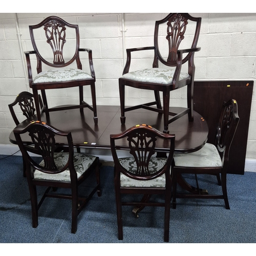 218 - A BRIDGECRAFT MAHOGANY TWIN PEDESTAL EXTENDING DINING TABLE, with one additional leaf, each pedestal... 