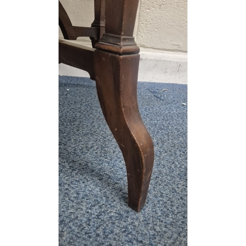 219 - AN EDWARDIAN MAHOGANY CIRCULAR CENTRE TABLE, raised on tapered supports and shaped legs, united by a... 