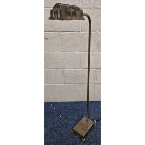 222 - LAURA ASHLEY, A BRASS STANDARD LAMP, with a moulded shade, raised on bracket-style feet, height 124c... 