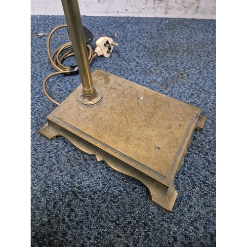 222 - LAURA ASHLEY, A BRASS STANDARD LAMP, with a moulded shade, raised on bracket-style feet, height 124c... 