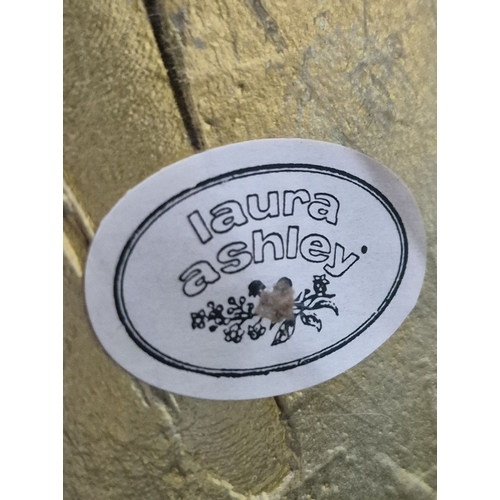 222 - LAURA ASHLEY, A BRASS STANDARD LAMP, with a moulded shade, raised on bracket-style feet, height 124c... 