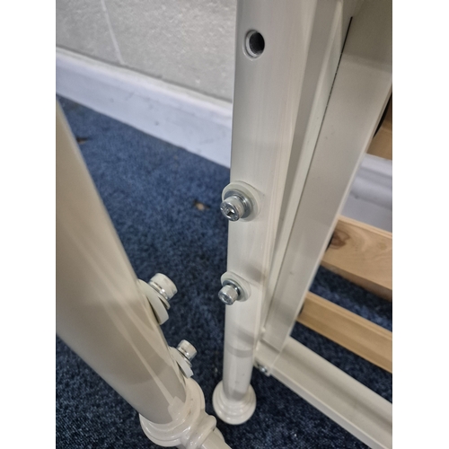 227 - A MODERN WHITE PAINTED TUBULAR METAL 4FT6 BEDSTEAD, with side rails, slats and bolts, condition repo... 