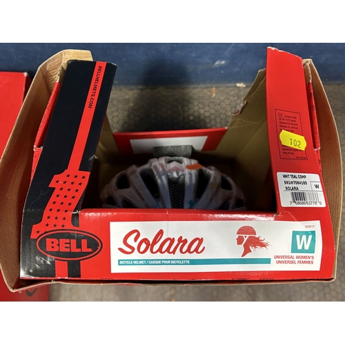 102 - TWO BOXED BELL BICYCLE HELMETS, one men's size XL, and a universal women's, two brand new cable lock... 