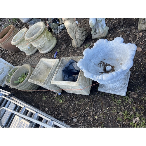 17 - FIVE CONCRETE PLANTERS, including a two-piece urn with an acanthus leaf bowl, 47cm across, a pair of... 