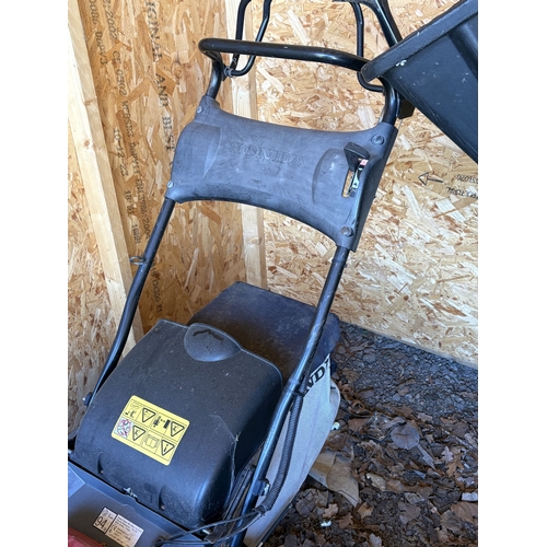 23 - A HONDA HRX 426 PETROL SELF-PROPELLED LAWNMOWER, with grass box, condition report: engine turns free... 