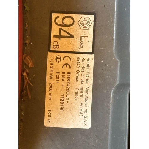 23 - A HONDA HRX 426 PETROL SELF-PROPELLED LAWNMOWER, with grass box, condition report: engine turns free... 