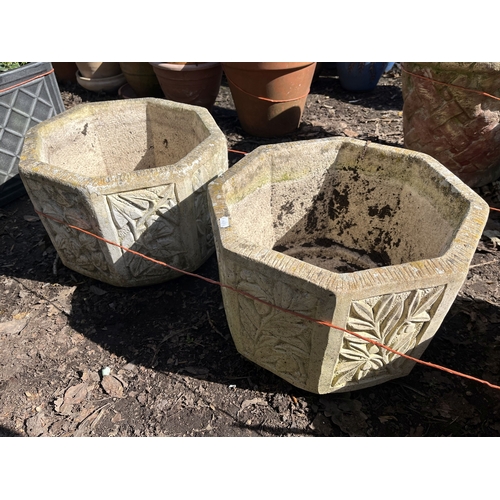 5 - FOUR CONCRETE GARDEN PLANTERS, including a pair of octagonal pots with foliate panels, 38cm across a... 