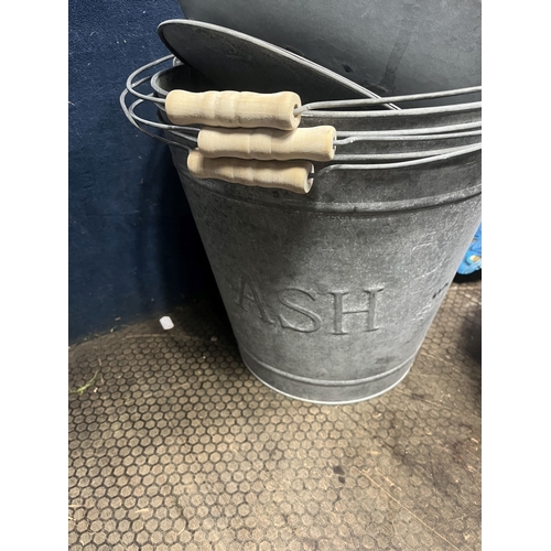 63 - A COLLECTION OF METALWARE, including four east2eden galvanised metal ash bins with lids, three Woodl... 