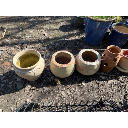 7 - A SELECTION OF TERRACOTTA PLANT POTS AND PLATTERS, the largest being 36cm in diameter (20+)