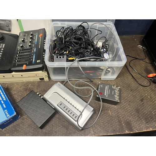76 - A LARGE COLLECTION OF AUDIO VISUAL CABLES AND ELECTRONIC EQUIPMENT: including video mixers, audio mi... 