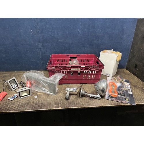 82 - A TRAY CONTAINING LIGHTING: including two LED remote control outside lamps, a vintage car lamp with ... 