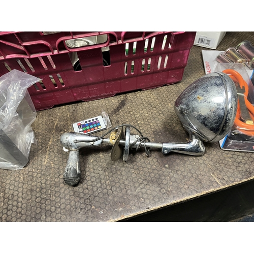 82 - A TRAY CONTAINING LIGHTING: including two LED remote control outside lamps, a vintage car lamp with ... 