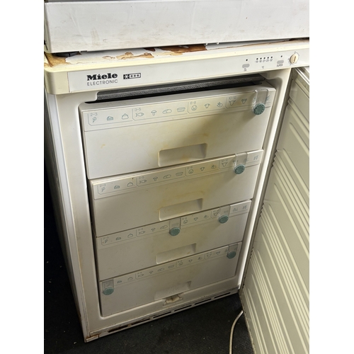97 - A MIELE ELECTRONIC UNDERCOUNTER FREEZER, width 56cm x depth 60cm x height 85cm, and a Panasonic 1000... 