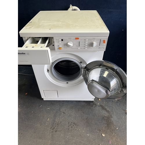 108 - A MIELE W945S WASHER DRYER, width 60cm, depth 60cm, height 85cm (PAT pass, spin cycle run but not te... 