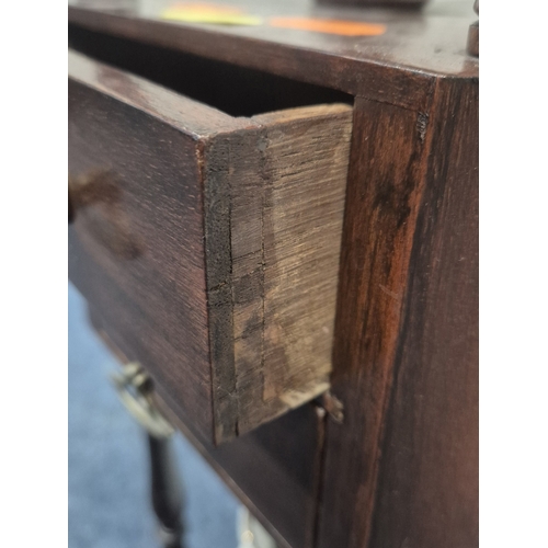 200 - A MAHOGANY WIG STAND, with a circular top, the triangle centre section with a lidded cup and two dra... 