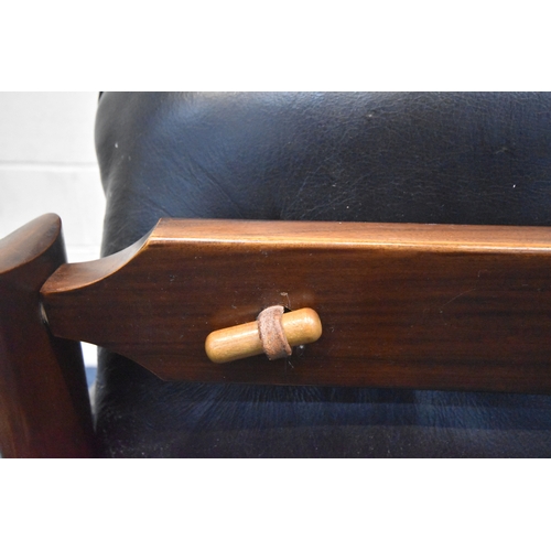 201 - POSSIBLY PERCIVAL LAFER, A MID CENTURY BRAZILIAN ROSEWOOD FRAMED MP-43 ARMCHAIR, with black leather ... 