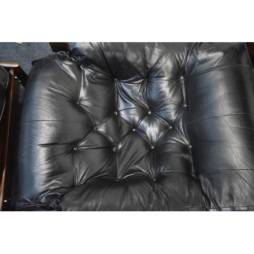 201 - POSSIBLY PERCIVAL LAFER, A MID CENTURY BRAZILIAN ROSEWOOD FRAMED MP-43 ARMCHAIR, with black leather ... 