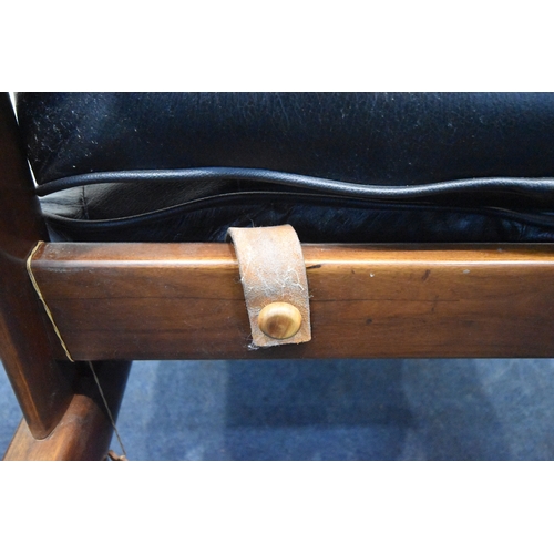 201 - POSSIBLY PERCIVAL LAFER, A MID CENTURY BRAZILIAN ROSEWOOD FRAMED MP-43 ARMCHAIR, with black leather ... 