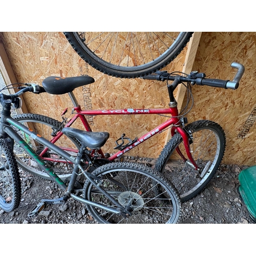 28 - THREE VARIOUS BICYCLES, including an Apollo pink girls bike, a Raleigh cyclone gents bike and a Rale... 