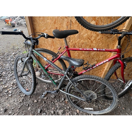 28 - THREE VARIOUS BICYCLES, including an Apollo pink girls bike, a Raleigh cyclone gents bike and a Rale... 