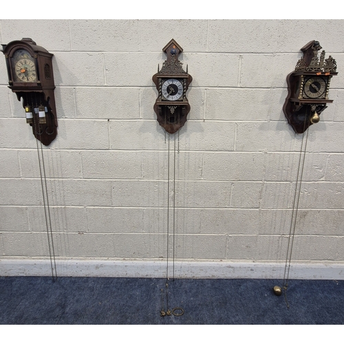 364 - TWO ZAANSE WALL CLOCKS, with brass figures holding a globe and raised gallery, one with two weights,... 
