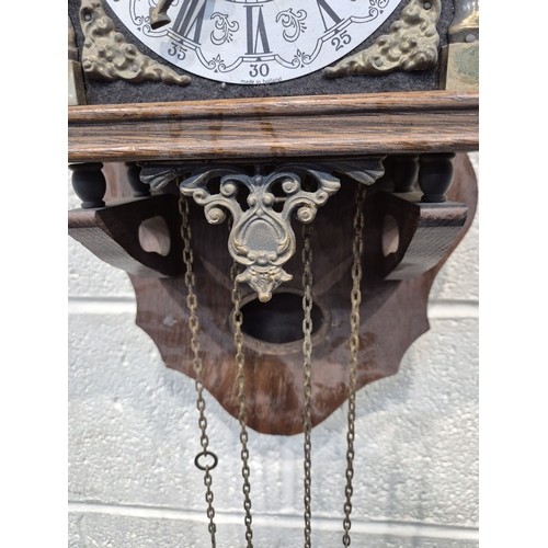 364 - TWO ZAANSE WALL CLOCKS, with brass figures holding a globe and raised gallery, one with two weights,... 