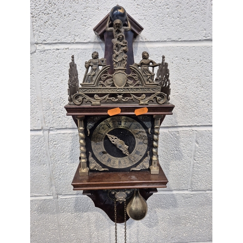 364 - TWO ZAANSE WALL CLOCKS, with brass figures holding a globe and raised gallery, one with two weights,... 