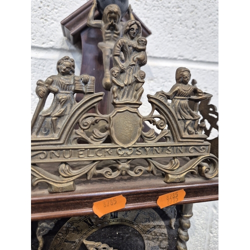 364 - TWO ZAANSE WALL CLOCKS, with brass figures holding a globe and raised gallery, one with two weights,... 