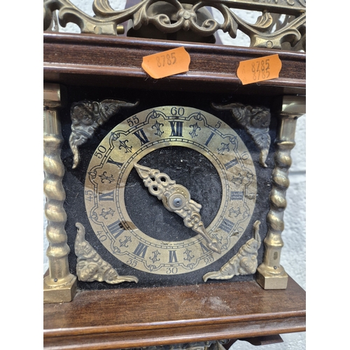 364 - TWO ZAANSE WALL CLOCKS, with brass figures holding a globe and raised gallery, one with two weights,... 