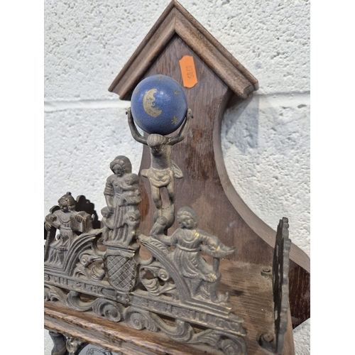 364 - TWO ZAANSE WALL CLOCKS, with brass figures holding a globe and raised gallery, one with two weights,... 