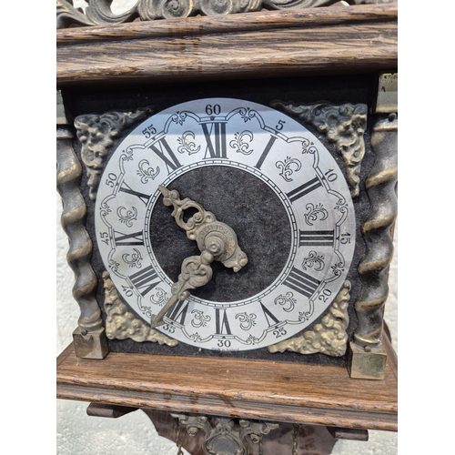 364 - TWO ZAANSE WALL CLOCKS, with brass figures holding a globe and raised gallery, one with two weights,... 