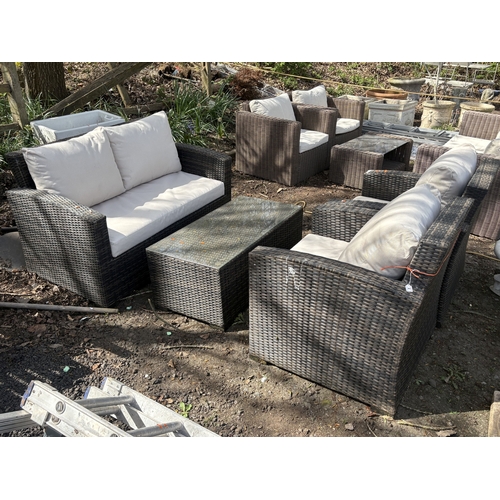 1 - A FAUX RATTAN FOUR-PIECE GARDEN SET, with loose cream cushions, comprising a two-seater settee, leng... 