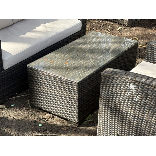 1 - A FAUX RATTAN FOUR-PIECE GARDEN SET, with loose cream cushions, comprising a two-seater settee, leng... 