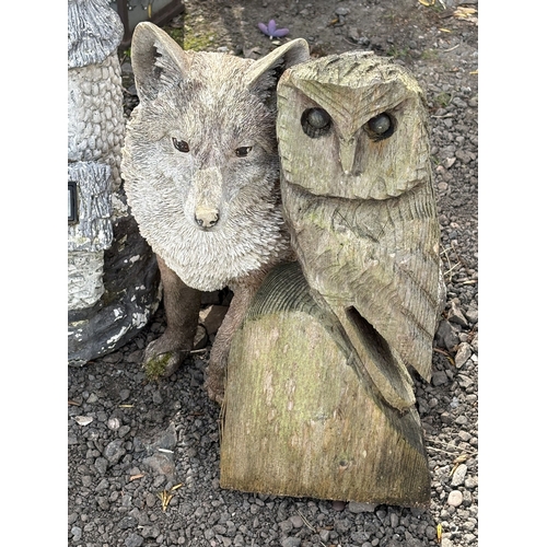 11 - A CAST IRON WATER PUMP, along with three plastic garden items including a fox, owl and stone house, ... 