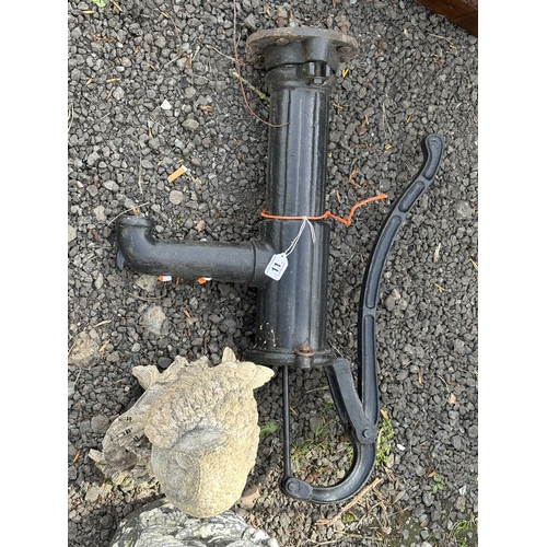 11 - A CAST IRON WATER PUMP, along with three plastic garden items including a fox, owl and stone house, ... 