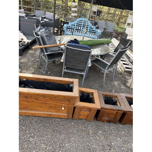 12 - A SELECTION OF STAINED PINE PLANTERS, including a single rectangular planter, width 100cm, and three... 