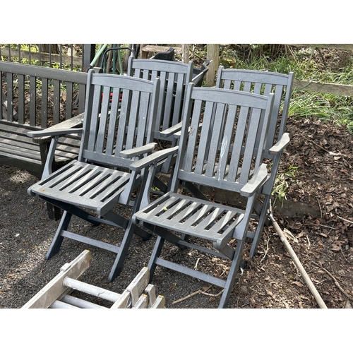 17 - A SELECTION OF PAINTED GARDEN FURNITURE, to include two benches, length 192cm, a coffee table, and f... 