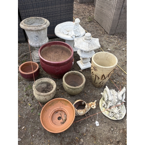 2 - A SELECTION OF GARDEN POTS AND ORNAMENTS, to include a mushroom-shaped bird bath with a girl sitting... 