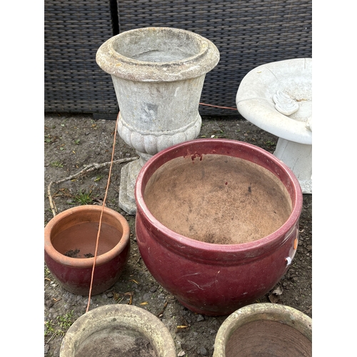 2 - A SELECTION OF GARDEN POTS AND ORNAMENTS, to include a mushroom-shaped bird bath with a girl sitting... 