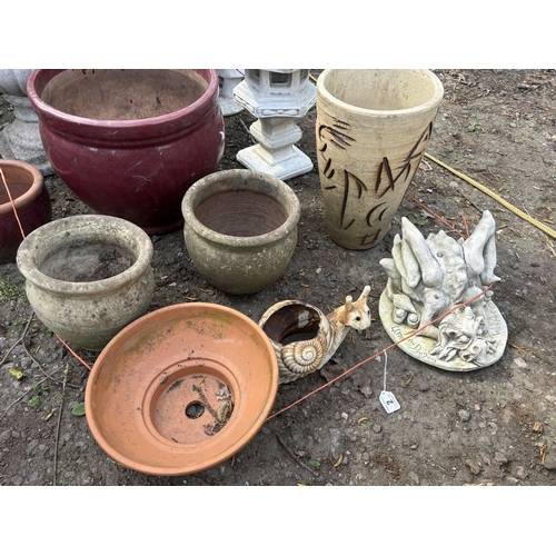 2 - A SELECTION OF GARDEN POTS AND ORNAMENTS, to include a mushroom-shaped bird bath with a girl sitting... 