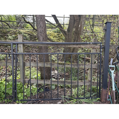 20 - A PAIR OF CAST METAL DOUBLE DRIVEWAY GATES, with posts, overall length between posts, 334cm, each ga... 