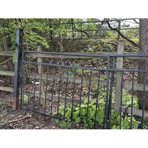 20 - A PAIR OF CAST METAL DOUBLE DRIVEWAY GATES, with posts, overall length between posts, 334cm, each ga... 