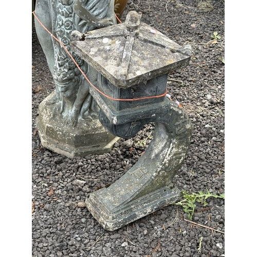 23 - A WEATHERED CONCRETE BIRD BATH, supported by three nude standing ladies and a religious figure, diam... 