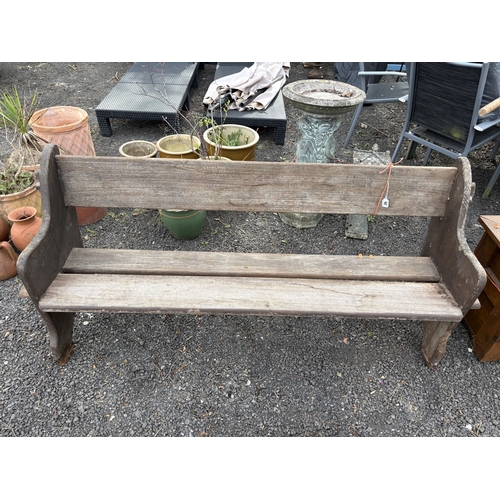 26 - A STAINED TEAK GARDEN BENCH, with pegs as construction, length 166cm, condition report: missing one ... 